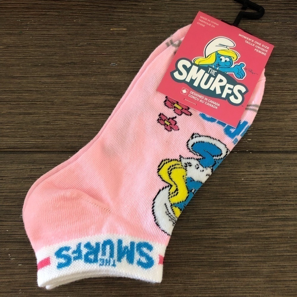 The Smurfs Womanโs one size pink floral low cut socks